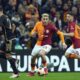 Galatasaray's Baris Yilmaz, center, runs with the ball during the Europa League play-off first league soccer match between Galatasaray and Sparta Praha in Istanbul, Turkey, Thursday, Feb. 15, 2024. (AP Photo/Francisco Seco)