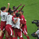 Qatar's Almoez Ali, centre, celebrates with teammates after scoring goal during the Asian Cup semifinal soccer match between Qatar and Iran at Al Thumama Stadium in Doha, Qatar, Wednesday, Feb. 7, 2024. (AP Photo/Hussein Sayed)
