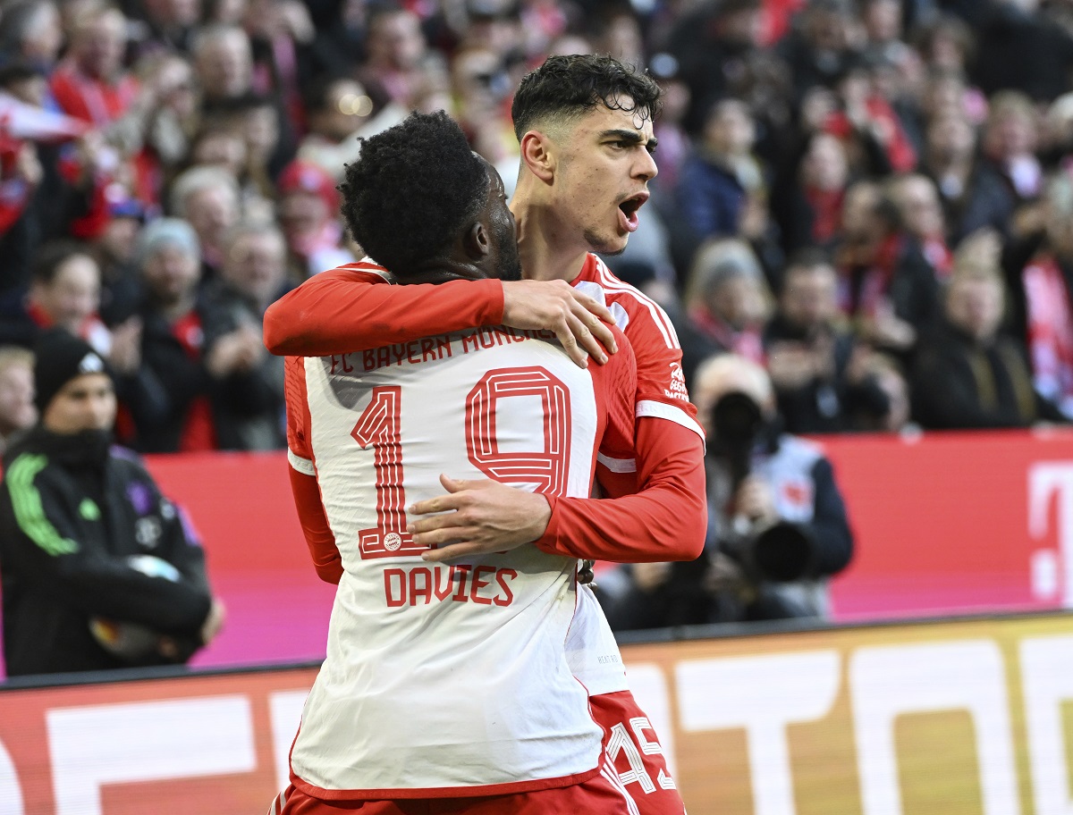 Bayern Munich's Aleksandar Pavlovic celebrates scoring his side's opening goal during the German Bundesliga soccer match between Bayern Munich and Borussia Moenchengladbach, at the Allianz Arena in Munich, Germany, Saturday, Feb. 3, 2024. (Angelika Warmuth/dpa via AP)