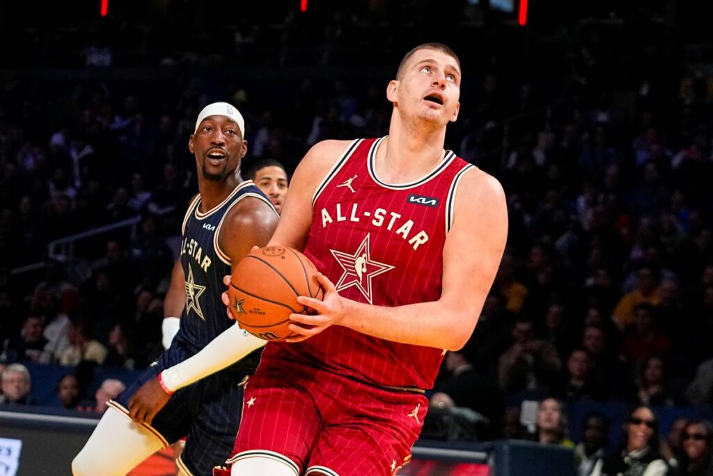 Denver Nuggets center Nikola Jokic (15) goes up for a shot during the first half of an NBA All-Star basketball game in Indianapolis, Sunday, Feb. 18, 2024. (AP Photo/Darron Cummings)