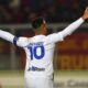 Inter's Lautaro Martínez celebrates scoring their side's first goal of the game during the Italian Serie A soccer match between Lecce and Inter at the Via del Mare stadium in Lecce, Italy, Sunday, Feb. 25, 2024. (Giovanni Evangelista/LaPresse via AP)