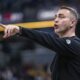 Toronto Raptors head coach Darko Rajakovic gestures during the first half of an NBA basketball game against the Indiana Pacers in Indianapolis, Monday, Feb. 26, 2024. (AP Photo/Doug McSchooler)