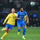 Al Nassr's Cristiano Ronaldo, left, fights for the ball with Al Hilal's Al Bulayhi during Riyadh Season Cup 2024 final match at Kingdom Arena Stadium in Riyadh, Saudi Arabia, Thursday, Feb. 8, 2024. (AP Photo)