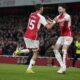 Arsenal's Jakub Kiwior, left, celebrates with Declan Rice after scoring his side's fourth goal during the English Premier League soccer match between Arsenal and Newcastle United at the Emirates stadium in London, England, Saturday, Feb. 24, 2024. (AP Photo/Alastair Grant)