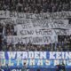Bochum supporters protest against investors during the German Bundesliga soccer match between VfL Bochum and Union Berlin in Bochum, Germany, on Dec. 16, 2023. From Brazil to Spain to Australia and beyond, the soccer landscape is changing quickly with a surge of investment firms injecting billions into clubs and leagues around the world. After a wave of wealthy states, billionaires and oligarchs getting into the sport, now it’s time for investment groups to start making a push to leave their footprints and earn a profit. (AP Photo/Martin Meissner, File)