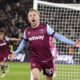West Ham United's Jarrod Bowen celebrates scoring his side's second goal of the game during the English Premier League soccer match between West Ham United and Brentford at the London Stadium, London, Monday Feb. 26, 2024. (John Walton/PA via AP)