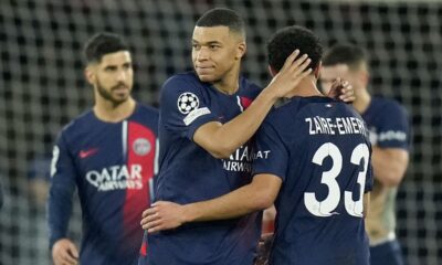 PSG's Kylian Mbappe, front left, celebrates with teammates at the end of the Champions League round of 16 first leg soccer match between Paris Saint-Germain and Real Sociedad, at the Parc des Princes stadium in Paris, France, Wednesday, Feb. 14, 2024. (AP Photo/Christophe Ena)