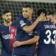 PSG's Kylian Mbappe, front left, celebrates with teammates at the end of the Champions League round of 16 first leg soccer match between Paris Saint-Germain and Real Sociedad, at the Parc des Princes stadium in Paris, France, Wednesday, Feb. 14, 2024. (AP Photo/Christophe Ena)
