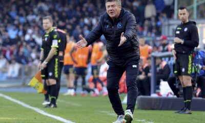 Napoli's head coach Walter Mazzarri reacts during the Serie A soccer match between Napoli and Genoa at the Diego Maradona Stadium in Naples, Italy, Feb. 17, 2024. (Alessandro Garofalo/LaPresse via AP)