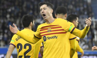Barcelona's Robert Lewandowski celebrates after scoring his side's opening goal during the La Liga soccer match between Deportivo Alaves and FC Barcelona at the Medizorrosa stadium in Vitoria, Spain, Saturday, Feb. 3, 2024. (AP Photo/Alvaro Barrientos)