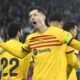 Barcelona's Robert Lewandowski celebrates after scoring his side's opening goal during the La Liga soccer match between Deportivo Alaves and FC Barcelona at the Medizorrosa stadium in Vitoria, Spain, Saturday, Feb. 3, 2024. (AP Photo/Alvaro Barrientos)