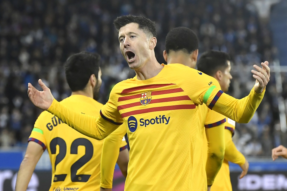 Barcelona's Robert Lewandowski celebrates after scoring his side's opening goal during the La Liga soccer match between Deportivo Alaves and FC Barcelona at the Medizorrosa stadium in Vitoria, Spain, Saturday, Feb. 3, 2024. (AP Photo/Alvaro Barrientos)
