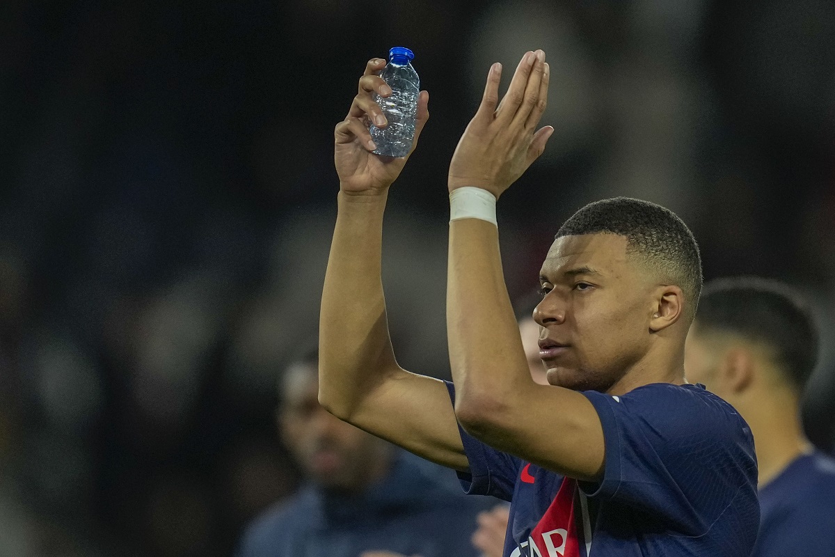 PSG's Kylian Mbappe celebrates at the end of the Champions League round of 16 first leg soccer match between Paris Saint-Germain and Real Sociedad, at the Parc des Princes stadium in Paris, France, Wednesday, Feb. 14, 2024. (AP Photo/Christophe Ena)