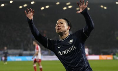 Bochum's Takuma Asano celebrates after scoring during the German Bundesliga soccer match between VfL Bochum and FC Bayern Munich in Bochum, Germany, Sunday, Feb. 18, 2024. (AP Photo/Martin Meissner)