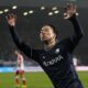 Bochum's Takuma Asano celebrates after scoring during the German Bundesliga soccer match between VfL Bochum and FC Bayern Munich in Bochum, Germany, Sunday, Feb. 18, 2024. (AP Photo/Martin Meissner)