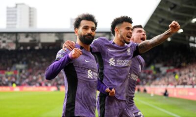 Liverpool's Mohamed Salah celebrates scoring his sides third goal during the English Premier League soccer match between Brentford and Liverpool at the Gtech Community Stadium in London, Saturday, Feb. 17, 2024. (AP Photo/Kirsty Wigglesworth)