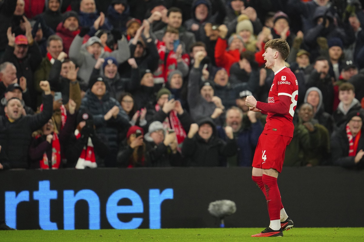 Liverpool's Conor Bradley celebrates after scoring his side's second goal during the English Premier League soccer match between Liverpool and Chelsea, at Anfield Stadium, Liverpool, England, Wednesday, Jan.31, 2024. (AP Photo/Jon Super)