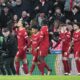 Liverpool's Virgil van Dijk, left, celebrates scoring a goal that was disallowed during the English League Cup final soccer match between Chelsea and Liverpool at Wembley Stadium in London, Sunday, Feb. 25, 2024.(AP Photo/Dave Shopland)