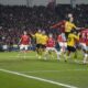 Dortmund's Nico Schlotterbeck, top right, out jumps PSV's Malik Tillman, top left, to head the ball during the Champions League round of 16 first leg soccer match between PSV Eindhoven and Borussia Dortmund at Philips stadium in Eindhoven, Netherlands, Tuesday, Feb. 20, 2024. (AP Photo/Peter Dejong)