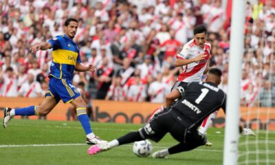 River Plate's Pablo Solari, right, scores the opening goal against Boca Juniors during an Argentine soccer league match in Buenos Aires, Argentina, Sunday, Feb. 25, 2024. (AP Photo/Natacha Pisarenko)