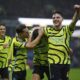Arsenal's Kai Havertz, centre, celebrates with teammates Declan Rice, right and Cedric Soares after scoring their side's fifth goal of the game , during the English Premier League soccer match between Burnley and Arsenal, at Turf Moor, in Burnley, England, Saturday, Feb. 17, 2024. (Peter Byrne/PA via AP)