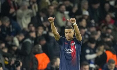 PSG's Kylian Mbappe celebrates after scoring his side's opening goal during the Champions League round of 16 first leg soccer match between Paris Saint-Germain and Real Sociedad, at the Parc des Princes stadium in Paris, France, Wednesday, Feb. 14, 2024. (AP Photo/Christophe Ena)