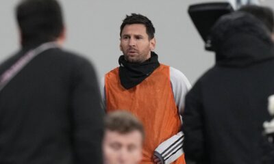 Inter Miami's Lionel Messi warms up during the friendly soccer match between Vissel Kobe and Inter Miami CF at the National Stadium, Wednesday, Feb. 7, 2024, in Tokyo, Japan. (AP Photo/Eugene Hoshiko)