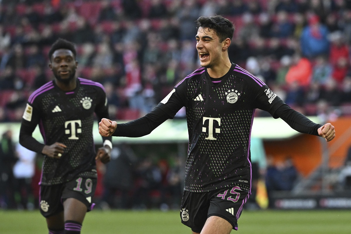 Munich's Aleksandar Pavlovic celebrates scoring during the Bundesliga soccer match between FC Augsburg and Bayern Munich at the WWK-Arena, Augsburg, Germany, Saturday Jan. 27, 2024. (Sven Hoppe/dpa via AP)