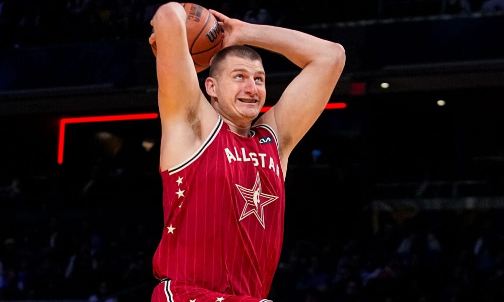 Denver Nuggets center Nikola Jokic (15) goes up for a shot during the first half of an NBA All-Star basketball game in Indianapolis, Sunday, Feb. 18, 2024. (AP Photo/Darron Cummings)