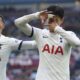 Tottenham Hotspur's Son Heung-Min, right, celebrates scoring against Aston Villa with teammate Pedro Porro during the English Premier League soccer match at Villa Park, Birmingham, England, Sunday March 10, 2024. (Nick Potts/PA via AP)