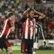 Brentford's Mathias Jorgensen, right reacts following a shot on goal during the English Premier League soccer match between Brentford and Manchester United at the Gtech Community Stadium in London, Saturday, March 30, 2024. (AP Photo/Ian Walton)