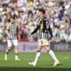 Juventus' Dusan Vlahovic walks off the pitch after getting a red card during the Italian Serie A soccer match between Juventus and Genoa at the Allianz Stadium in Turin, Italy, Sunday, March 17, 2024. (Marco Alpozzi/LaPresse via AP)
