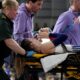 Margot Chevrier, of France, is carried on a stretcher after getting injured in the women's pole vault during the World Athletics Indoor Championships at the Emirates Arena in Glasgow, Scotland, Saturday, March 2, 2024. (AP Photo/Bernat Armangue)