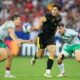 FILE - Wales' Louis Rees-Zammit, center, passes the ball during the Rugby World Cup Pool C match between Wales and Portugal in the Stade de Nice, in Nice, France, Sept. 16, 2023. Rees-Zammit, whose favorite NFL player growing up was three-time Pro Bowl wide receiver DeSean Jackson, is one of 16 athletes from eight countries participating in the NFL International Player Pathway program. It was established in 2017 to provide elite athletes from around the world the opportunity to earn a spot on an NFL roster and increase the number of international players in the league. (AP Photo/Pavel Golovkin, File)