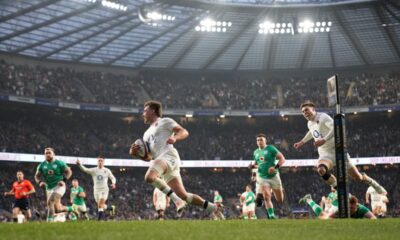 England's George Furbank crosses the line to score a try during the Six Nations rugby union international match between England and Ireland at Twickenham stadium, London Saturday, March 9, 2024. (AP Photo/Alastair Grant)