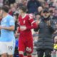 Liverpool's manager Jurgen Klopp instructs his players during the English Premier League soccer match between Liverpool and Manchester City, at Anfield stadium in Liverpool, England, Sunday, March 10, 2024. (AP Photo/Jon Super)