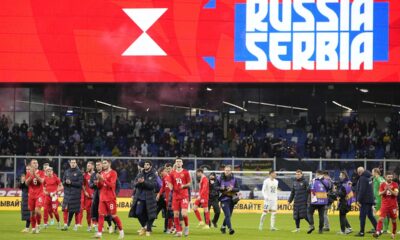 Russia players celebrate their victory at the international friendly soccer match between Russia and Serbia at the Central Dynamo Stadium of Lev Yashin in Moscow, Russia, Thursday, March 21, 2024. (AP Photo/Alexander Zemlianichenko)