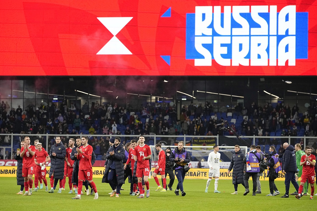 Russia players celebrate their victory at the international friendly soccer match between Russia and Serbia at the Central Dynamo Stadium of Lev Yashin in Moscow, Russia, Thursday, March 21, 2024. (AP Photo/Alexander Zemlianichenko)
