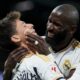Real Madrid's Arda Guler celebrates with his teammates after scoring his side's fourth goal the Spanish La Liga soccer match between Real Madrid and Celta Vigo at the Santiago Bernabeu stadium in Madrid, Spain, Sunday, March 10, 2024. (AP Photo/Manu Fernandez)
