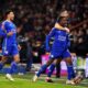 Leicester City's Abdul Fatawu, right, celebrates with Conor Coady and and James Justin, left, after scoring the opening goal during the FA Cup 5th round soccer match at the Vitality stadium in Bournemouth, England, Tuesday, Feb. 27, 2024. (John Walton/PA via AP)