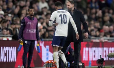 England coach Gareth Southgate speaks to England's Jude Bellingham as he leaves the pitch after being substituted during a friendly soccer match between England and Brazil at Wembley Stadium in London, Saturday, March 23, 2024. (AP Photo/Alastair Grant)