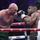 FILE - Tyson Fury, left, fights with Francis Ngannou, right, during their boxing fight in Riyadh, Saudi Arabia, Sunday, Oct. 29, 2023. Former UFC champion Francis Ngannou has already made a dramatic entry into the world of boxing by knocking down Tyson Fury in his first ever fight and taking the world heavyweight champion the distance. Now Ngannou is getting another shot at a high-profile heavyweight when he takes on Anthony Joshua back in Saudi Arabia. (AP Photo/Yazeed Aldhawaihi, File)