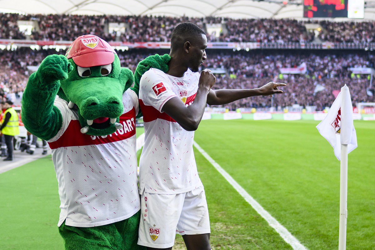 Stuttgart's Serhou Guirassy celebrates after scoring the opening goal during the Bundesliga soccer match between VfB Stuttgart and 1. FC Heidenheim in Stuttgart, Germany, Sunday, March 31, 2024. (Tom Weller/dpa via AP)