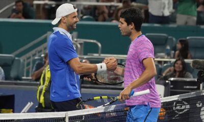 Grigor Dimitrov of Bulgaria and Carlos Alcaraz of Spain greet each other at the end of their match during the Miami Open tennis tournament, Thursday, March 28, 2024, in Miami Gardens, Fla. Dimitrov defeated Alcaraz. 6-2, 6-4. (AP Photo/Marta Lavandier)