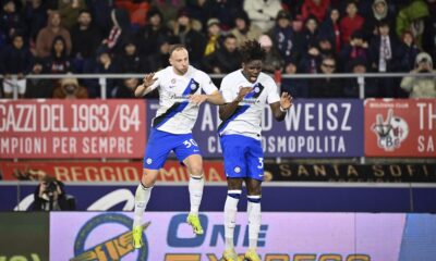 Inter's Yann Aurel Bisseck, right, celebrates scoring during the Serie A soccer match between Bologna and Inter FC at Renato Dall'Ara Stadium, Bologna, Italy, Saturday March 9, 2024. (Massimo Paolone/LaPresse via AP)