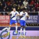Inter's Yann Aurel Bisseck, right, celebrates scoring during the Serie A soccer match between Bologna and Inter FC at Renato Dall'Ara Stadium, Bologna, Italy, Saturday March 9, 2024. (Massimo Paolone/LaPresse via AP)