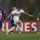 PSG's Kylian Mbappe, right, is challenged by Barcelona's Pau Cubarsi during the Champions League quarterfinal second leg soccer match between Barcelona and Paris Saint-Germain at the Olimpic Lluis Companys stadium in Barcelona, Spain, Tuesday, April 16, 2024. (AP Photo/Emilio Morenatti)