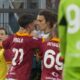 Roma's Paulo Dybala, front left, argues with Lazio's Matteo Guendouzi during a Serie A soccer match between Roma and Lazio, at Stadio Olimpico, in Rome, Italy, Saturday, April 6, 2024. (AP Photo/Gregorio Borgia)