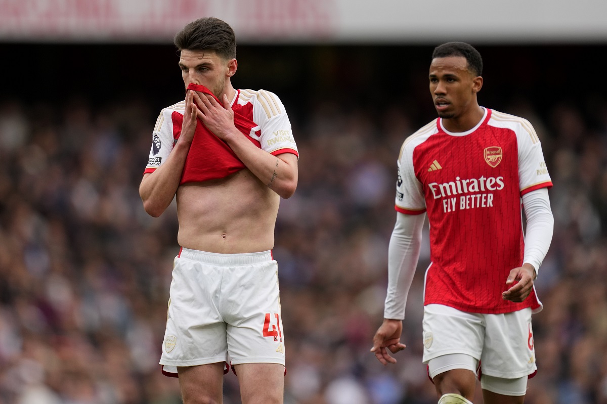 Arsenal's Declan Rice, left, reacts besides Arsenal's Gabrielvduring the English Premier League soccer match between Arsenal and Aston Villa at the Emirates stadium in London, Sunday, April 14, 2024. (AP Photo/Kirsty Wigglesworth)