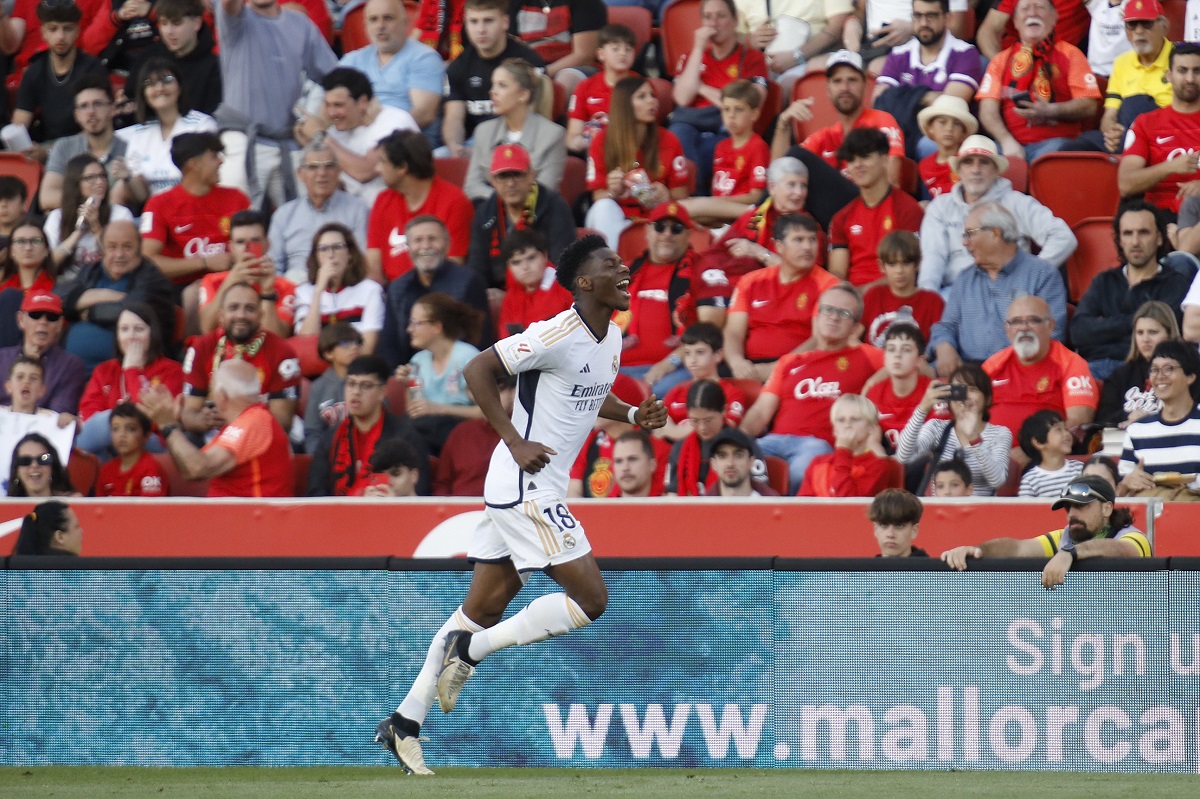 Real Madrid's Aurelien Tchouameni celebrates after scoring the opening goal during a Spanish La Liga soccer match between Mallorca and Real Madrid at the Son Moix stadium in Palma de Mallorca, Spain, Saturday, April 13, 2024. (AP Photo/Francisco Ubilla)